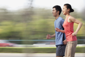 Chinese couple running together