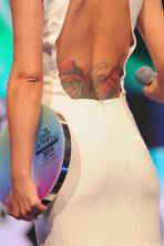 H'way petal: Cheryl flashes her rose tattoo at Radio One Teen Choice Awards