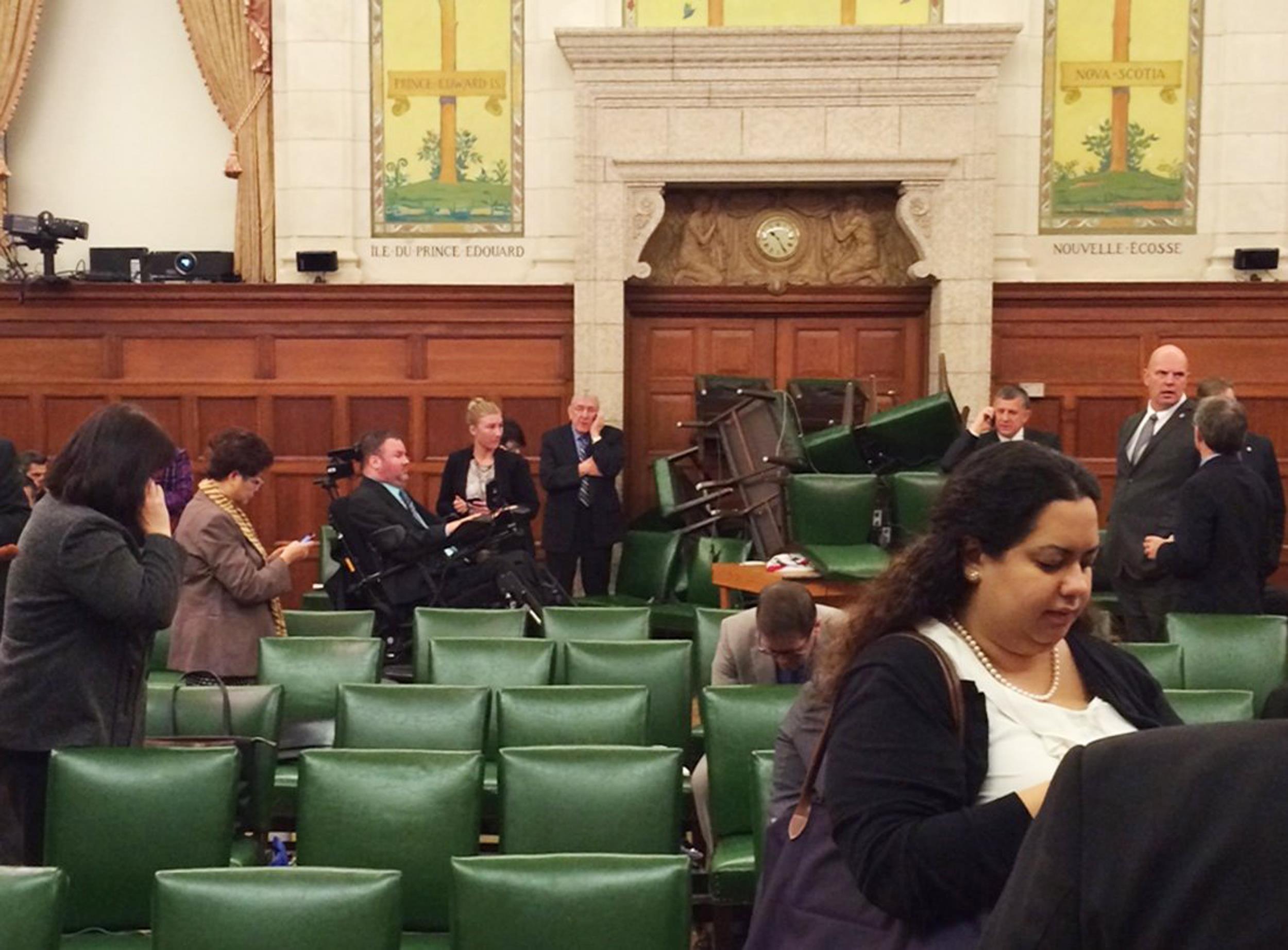 Image: The Conservative Party caucus room is shown shortly after shooting began on Parliament Hill, in Ottawa