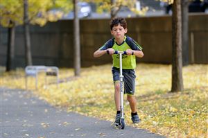  Isaac Tabachnick, 8, of Mount Washington rides his scooter on the Eliza Furnace section of the Three Rivers Heritage Trail near Grant Street, Downtown..