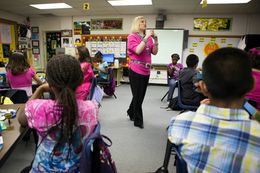 Bayless Elementary teacher Holly Guillmen identifies and explains the use of the contents of the Waterwise home water conservation kit provided to students by the High Plains Underground Water District in Lubbock, Texas, Oct. 17, 2012.