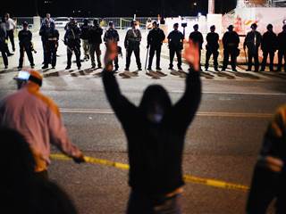 Protesters Clash With Ferguson Cops After Michael Brown Autopsy Leaked