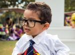 Sebastian O'Con, dressed as Clark Kent, pulls open his shirt to reveal his Superman costume underneath during a special Toddler Tuesday Halloween Ball at Discovery Green Tuesday, Oct. 28, 2014, in Houston. Children were treated to story time, dancing and a costume contest during the midday event.