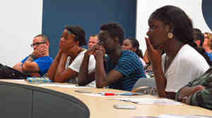Students at Broward College in Fort Lauderdale, Fla., attend a debt management workshop. Broward is one of 29 colleges that no longer accepts unsubsidized student loans. The effort is part of an experiment to cut down on student loan debt and defaults.