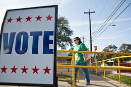 Vote signs outside early voting locations in Austin on Feb. 23, 2014.