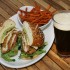 Belly up to East Hampton’s Fried Chicken + Jack, a Southern-fried cutlet with pepper jack cheese, bacon, avocado mash, and greens. Lee Chastain