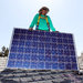 A SolarCity worker installs a roof panel in Camarillo, Calif.