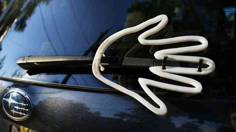 The Wiper Wave, attached to your car's rear wiper, promises to take a bit of the tension out of the rough commute.