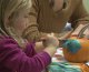Painting a pumpkin teal for food allergy awareness (WBZ-TV)