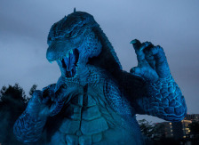 TOKYO, JAPAN - JULY 17: (EDITORIAL USE ONLY) A 6.6 meter replica Godzilla is lit up during a press preview at Tokyo Midtown on July 17, 2014 in Tokyo, Japan. The 'MIDTOWN Meets GODZILLA' project is in collaboration with the Japan release of the Hollywood film version of 'Godzilla' The Godzilla built on the lawns of Tokyo Midtown will host a light show everynight complete with mist, audio and fire rays.