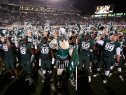 EAST LANSING, MI - OCTOBER 04:  The Michigan State Spartans celebrate a 27-22 win over the Nebraska Cornhuskers at Spartan Stadium on October 4, 2014 in East Lansing, Michigan. (Photo by Gregory Shamus/Getty Images)
