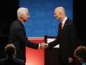 Former Florida Governor and Democratic candidate for Governor Charlie Crist (L) and Republican Florida Governor Rick Scott shake hands after finishing their televised debate at Broward College on October 15, 2014 in Davie, Florida. Governor Scott is facing off against Crist in the November 4, 2014 governors race.  (Photo by Joe Raedle/Getty Images)