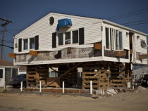 A house remains under construction one year after being partially destroyed by Superstorm Sandy, October 29, 2013 in Dover Beach North, New Jersey. (Photo by Kena Betancur/Getty Images)