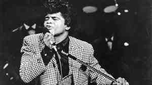 James Brown performs onstage at the TAMI Show on December 29, 1964 at the Santa Monica Civic Auditorium in California.