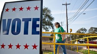 Vote signs outside early voting locations in Austin on Feb. 23, 2014.