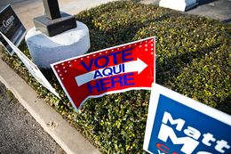 Vote signs outside of early voting locations in Austin on Feb. 23, 2014.