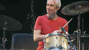 Charlie Watts, still laying down beats for The Rolling Stones, in a 2010 New York concert.