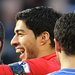 Liverpool’s Luis Suárez patting Chelsea’s Branislav Ivanovic on the head Sunday. During the teams’ 2-2 tie, Suárez bit Ivanovic.