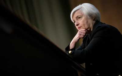 Fed ends bond-buying scheme; keeps interest rates low for now