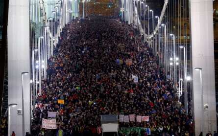 Tens of thousands take to Hungary's streets in latest Internet tax protest