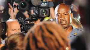 Captain Ron Johnson of the Missouri Highway Patrol speaks to media during a protest on West Florissant Avenue in Ferguson, Missouri.