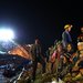 Relatives of trapped miners waited as rescuers tried to reach them late Tuesday.