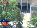 Police say a man rammed a truck several times into the WMAR-TV building just before noon Tuesday.