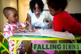 Keshawn Johnson, then 20, colored earlier this year with her sons  (l-r) Keenan Mitchell, 20 months, and Kenny Mitchell, 3,  in their home in North Dallas.