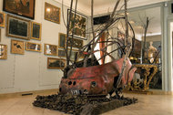 Vincent Dubourg’s installation ‘‘La Voiture aux Oiseaux’’ was acquired in 2007 by the Musée de la Chasse et de la Nature in Paris. It consists of the carcass of an abandoned vehicle invaded by branches and birds nests. 