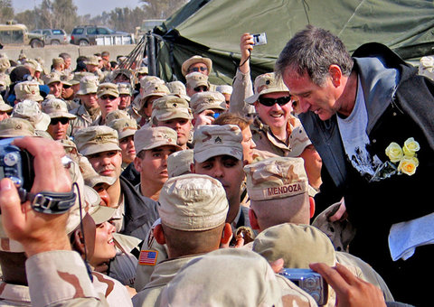 Robin Williams greeted troops at a December 2004 U.S.O. stop in Baghdad.