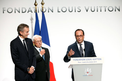 President François Hollande of France at the opening of the Fondation Louis Vuitton, with, from left, Bernard Arnault, chairman of LVMH Moët Hennessy Louis Vuitton, and Frank Gehry, who designed the new museum.