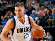Chandler Parsons of the Dallas Mavericks handles the ball against the Houston Rockets on October 7, 2014 at the American Airlines Center in Dallas, Texas. (credit: Glenn James/NBAE via Getty Images)