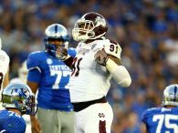 LEXINGTON, KY - OCTOBER 25: Preston Smith #91 of the Mississippi State Bulldogs celebrates a sack during the game against the Kentucky Wildcats at Commonwealth Stadium on October 25, 2014 in Lexington, Kentucky. (Photo by Andy Lyons/Getty Images)