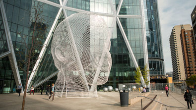 “Wonderland,” a 39-foot-tall sculpture by Jaume Plensa, outside the Bow Tower in Calgary.