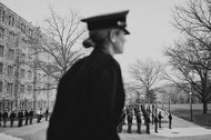 Lindsey Danilack, center, class of 2014, the brigade commander for the entire student body, looking over cadets in lunch formation outside the mess hall.