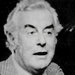 Gough Whitlam, prime minister of Australia, awaiting midterm election results with Labor Party supporters in 1974.