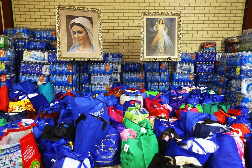 A photo of donated water at an emergency shelter run by the Sacred Heart Catholic Church in McAllen, Tx.