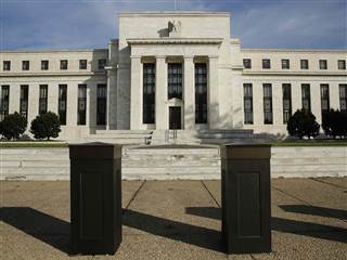 Fed Ends Historic Easing Program, Signals Confidence in Economy