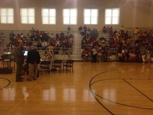 Community members pack the gym at Lincoln School for a public meeting about the school's failing accountability scores. 
