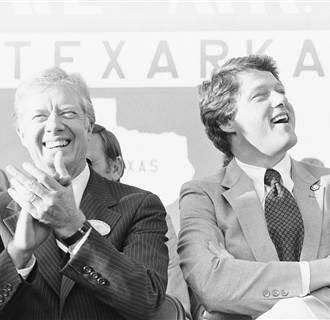Image: President Jimmy Carter, left, and Gov. Bill Clinton