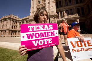 A day after a federal appeals court allowed Texas to begin enforcing new abortion restrictions, a group protested the ruling on the South Steps of the Texas Capitol building.