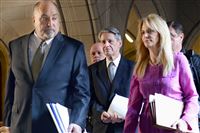 Robert Ferrante, center, is flanked by his defense attorneys as he is escorted into a courtroom Oct. 23.