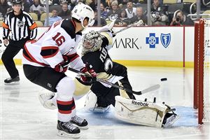  The Devils' Jacob Josefson scores on a breakaway on Penguins goalie Marc-Andre Fleury in the second period.