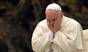 Pope Francis gestures during his audience with members of the Schoenstatt movement at the Paul VI hall on October 25, 2014 at the Vatican