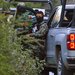 Soldiers escorted a convoy carrying forensics experts to a mountainous area in the state of Guerrero.