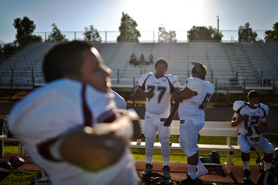 Arlington High School football players before the first game of the season in Riverside, Calif. A player's death from a contact injury last year led to a severe drop in participation.