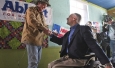 Ted Nugent shakes hands with the candidate as he speaks at a campaign event for Greg Abbott at El Guapo's restaurant in Denton on February 18, 2014.