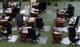 Davis stands on a nearly empty Senate floor as she filibusters in an effort to kill an abortion bill June 25, 2013, in Austin. The bill would ban abortion after 20 weeks of pregnancy and force many clinics that perform the procedure to upgrade their facilities and be classified as ambulatory surgical centers.