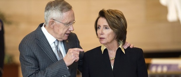 Senate Majority Leader Harry Reid (D-NV) speaks with House Minority Leader Nancy Pelosi (D-CA) after a ceremony to present a Congressional Gold Medal in honor of the Fallen Heroes of 9/11