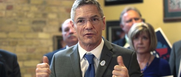 Democratic Candidate for the Michigan Governor's race Mark Schauer addresses his supporters during a stop at a coffee shop in Bay City